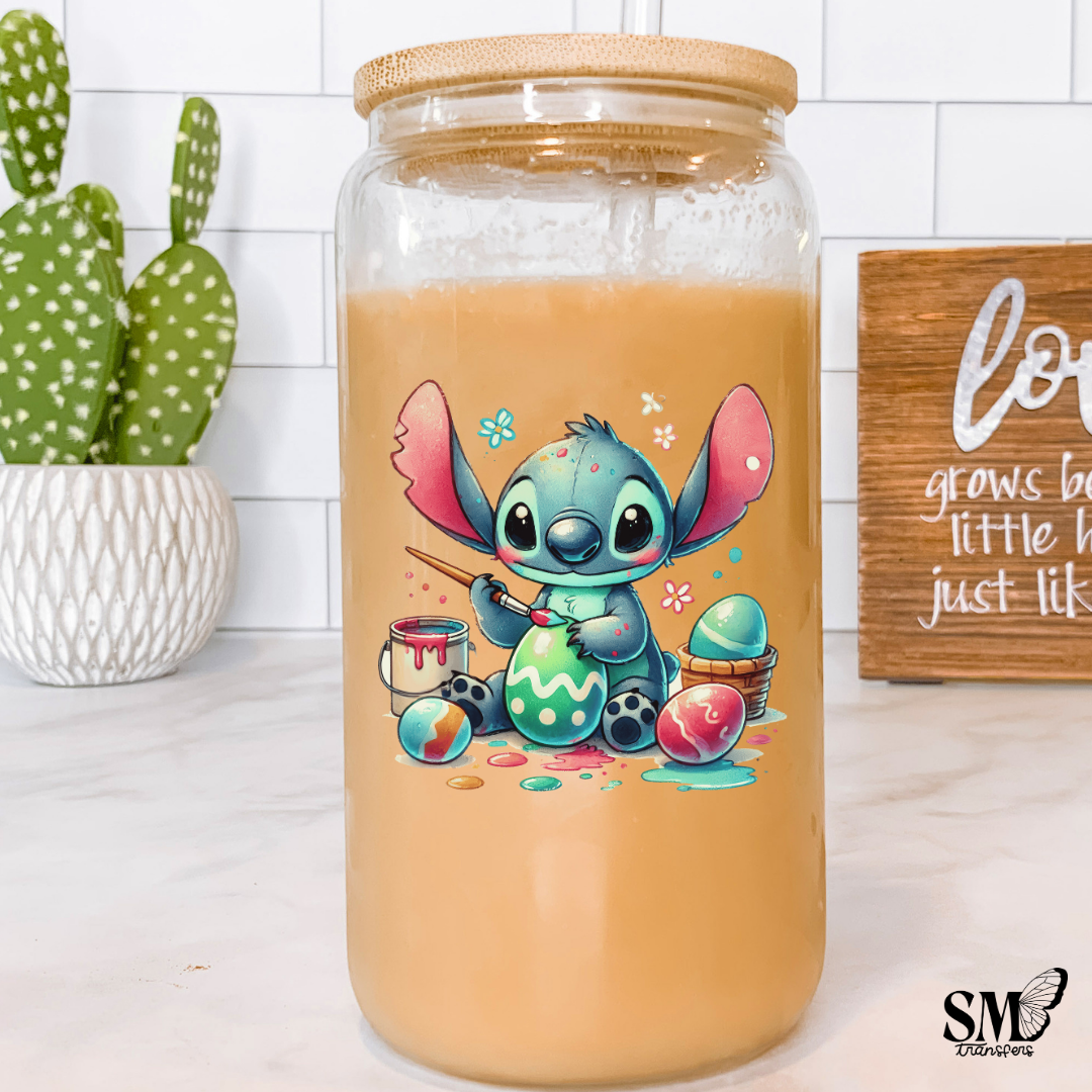 Big Blue Eared Cartoon Guy Painting Easter Eggs - cup decal